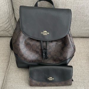 Coach backpack and matching wallet.